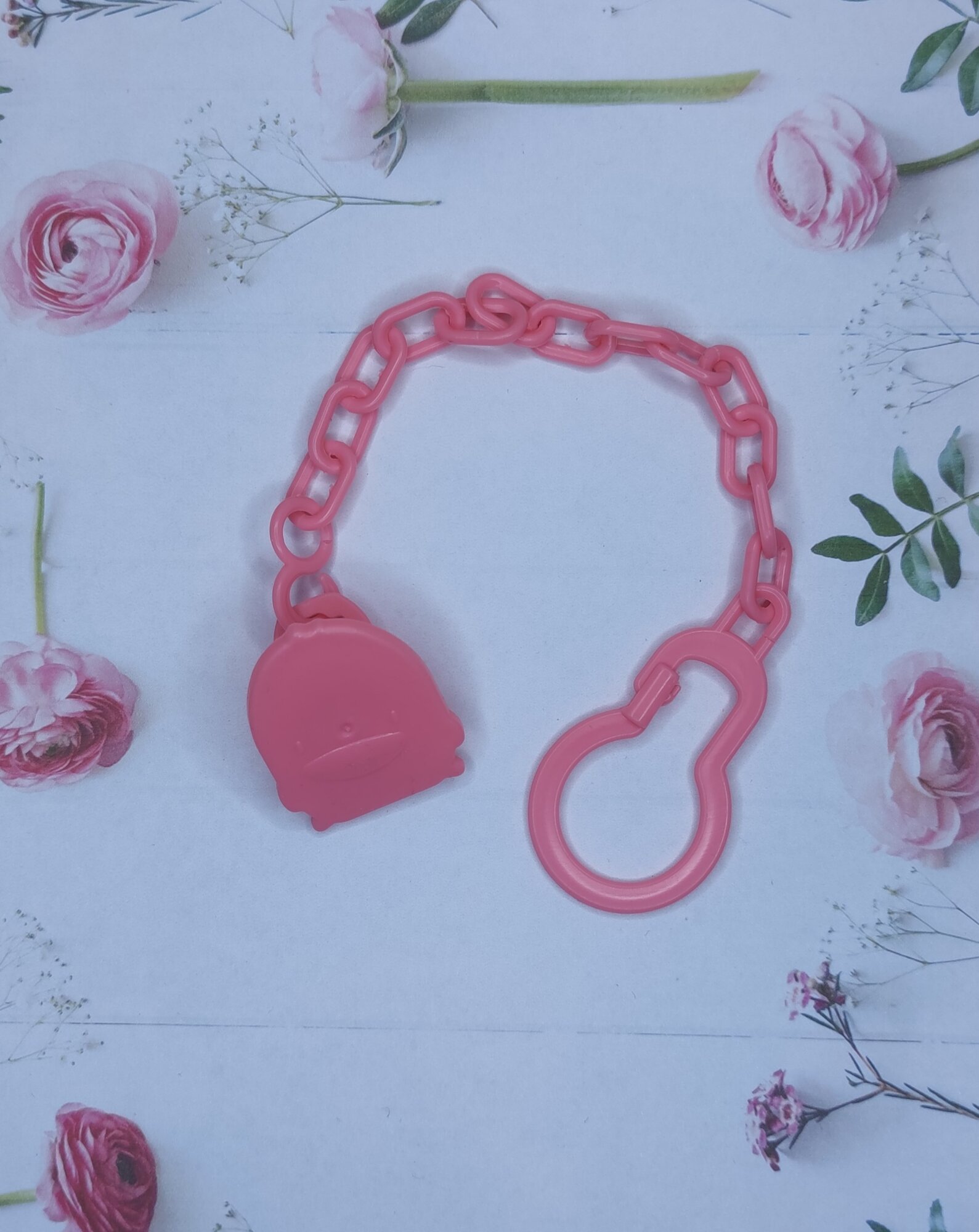 фото Прищепка для соски "Сюрприз", розовая