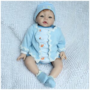 Фото Reborn Kaydora Кукла Реборн мягконабивная (Reborn Cloth Body Doll 22 inch) Мальчик в голубом халатике в шапке (56 см)