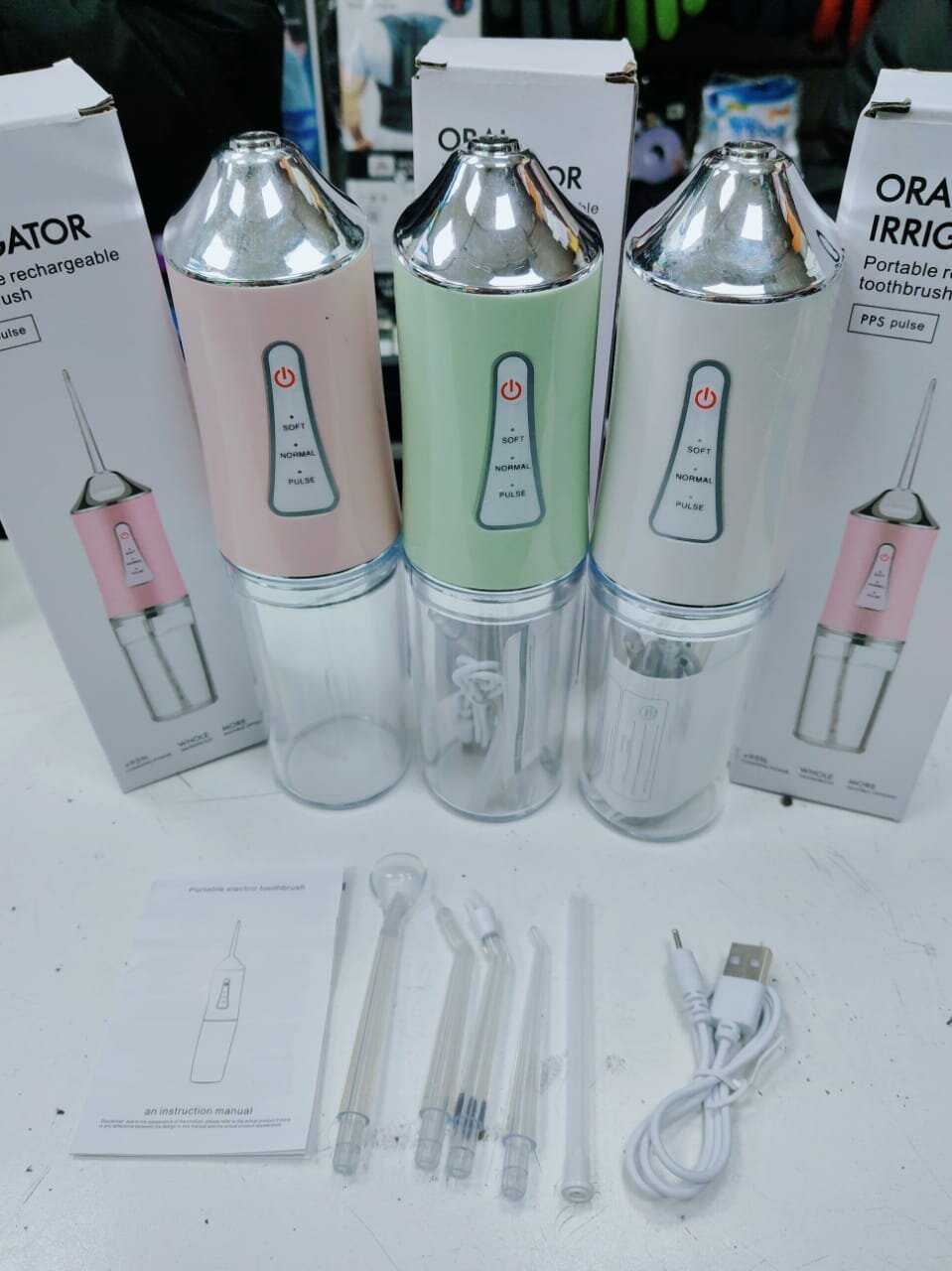 Ирригатор портативный беспроводной для очистки полости рта 4 насадки ORAL IRRIGATOR (флоссер) с USB зарядкой, розовый