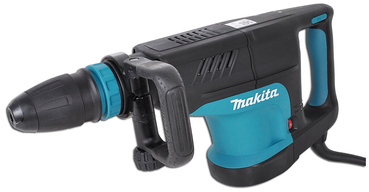 Makita HM1203C Молоток отбойный SDS-max [HM1203C] {1510Вт,25.5Дж,950-1900у\м,9.2кг, чем, м\функц бок рукоятка, плавный пуск }