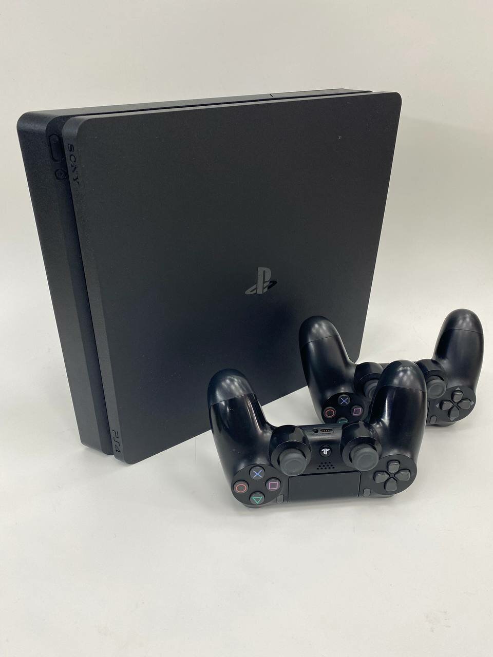 Игровая приставка Sony PlayStation 4 Slim 1000 ГБ HDD, без игр, черный