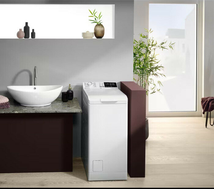 Стиральная машина Electrolux EW6TN4261, с вертикальной загрузкой, 6кг, английский - фото №3