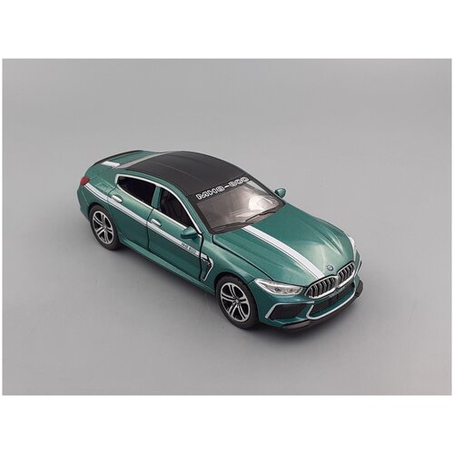 фото Металлическая инерционная машинка бмв м8 bmw m8 manhart 1:32 16 см boom toys