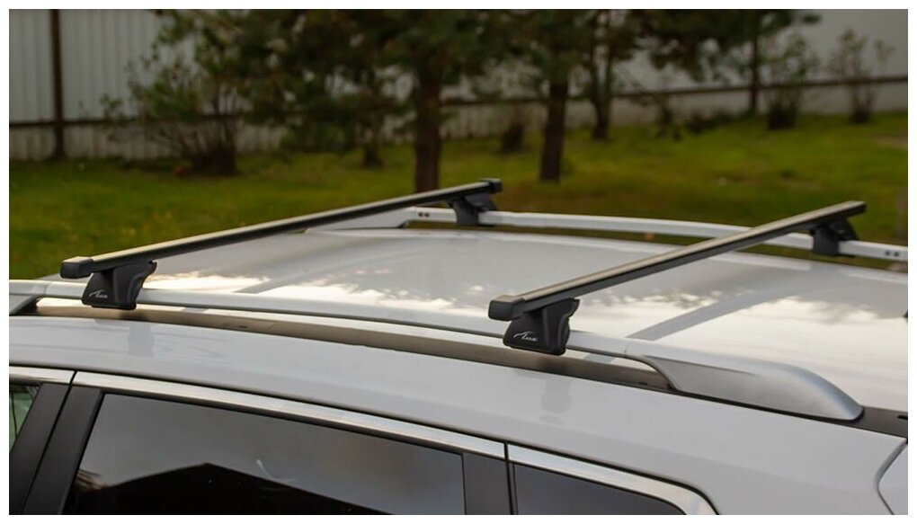 Багажник на крышу LUX классик прямоугольные дуги 12м на Санг Енг Актион (с рейлингами) 2005-2022 арт:21303-01