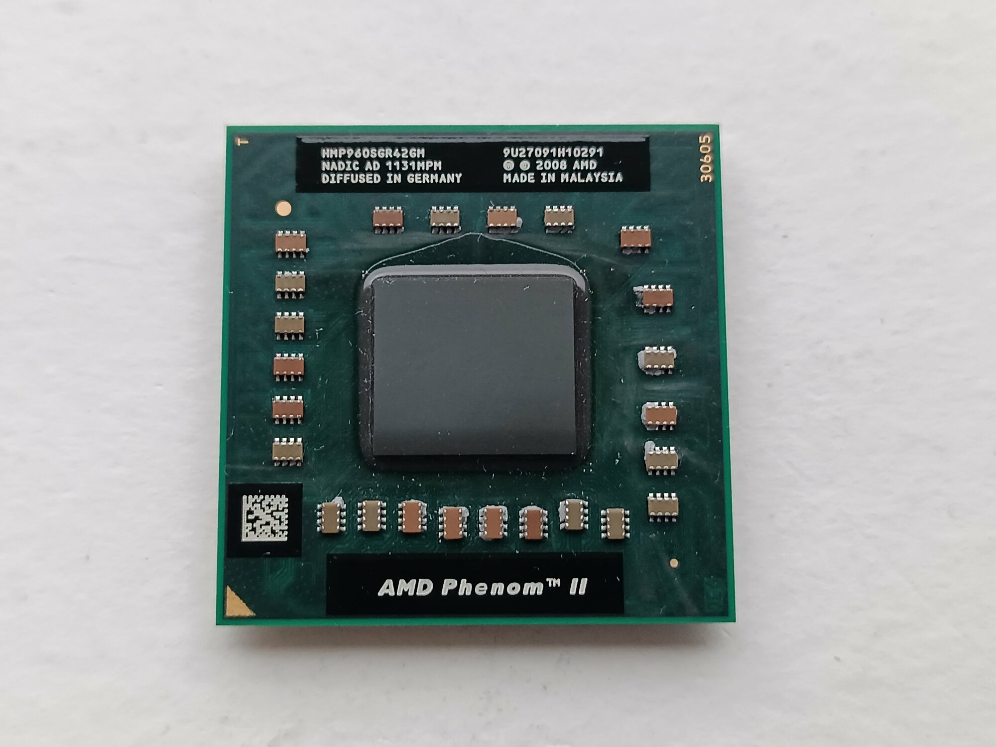 AMD Phenom II P960, 1.8GHz, Champlain, 25w, 4 ядра, 4 потока, Socket S1, процессор для ноутбука — фото 1