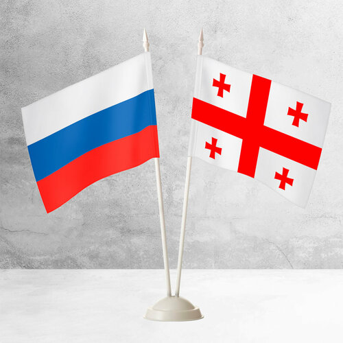 Настольные флаги России и Грузии на пластиковой белой подставке