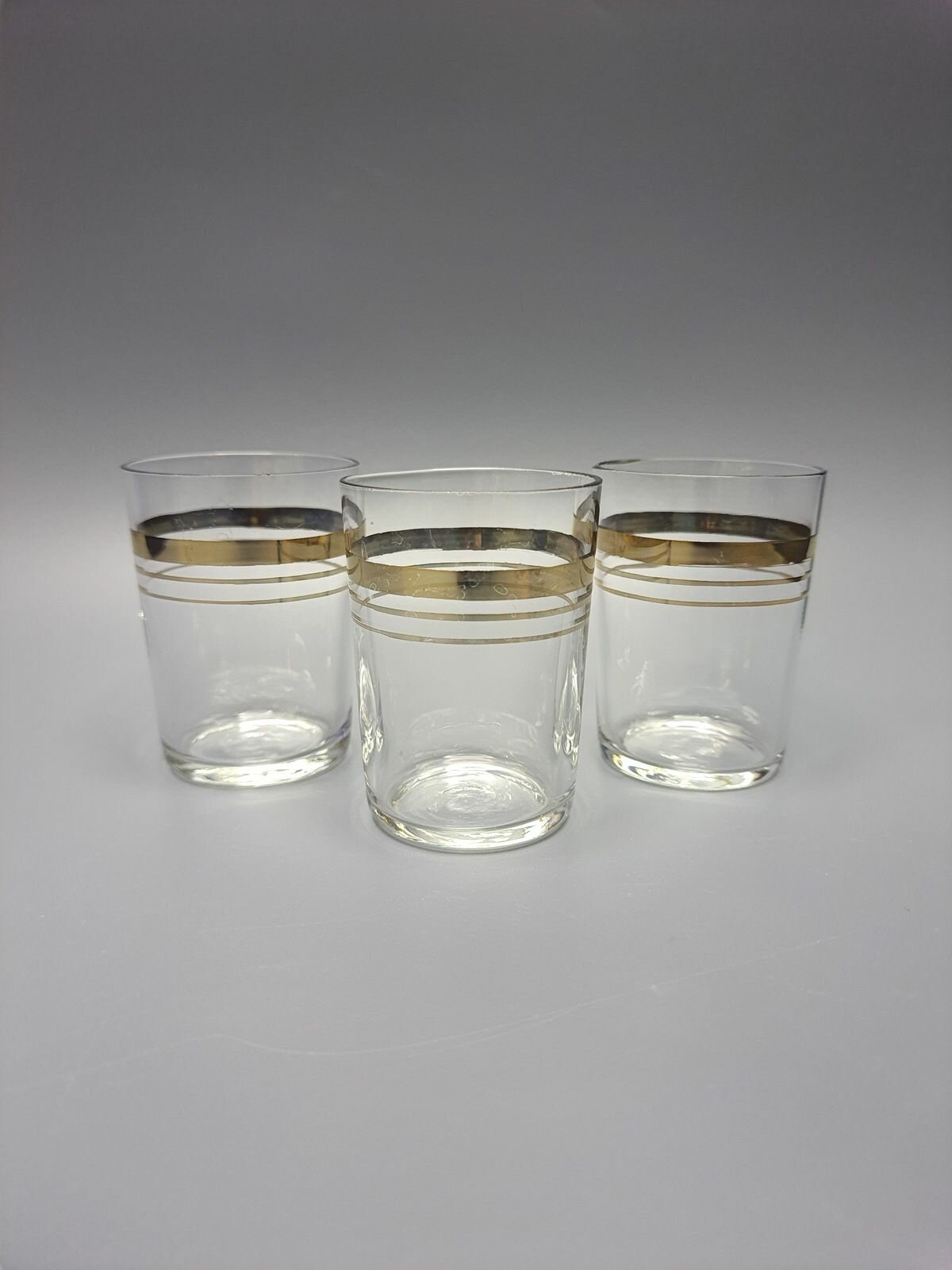 Набор стопок на 3 персоны с декором в виде золоченых полос, стекло, СССР, 1970-1990 гг