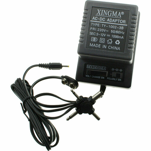 Блок питания 1А универсальный 3-12В TY1002 Xingma нестабилизированная 6 насадок 99500₽