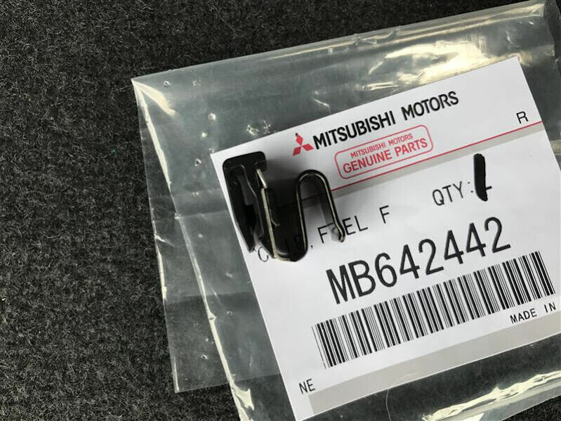 Пружина лючка топливного бака Mitsubishi MB642442 оригинал для широкого модельного ряда Mitsubishi