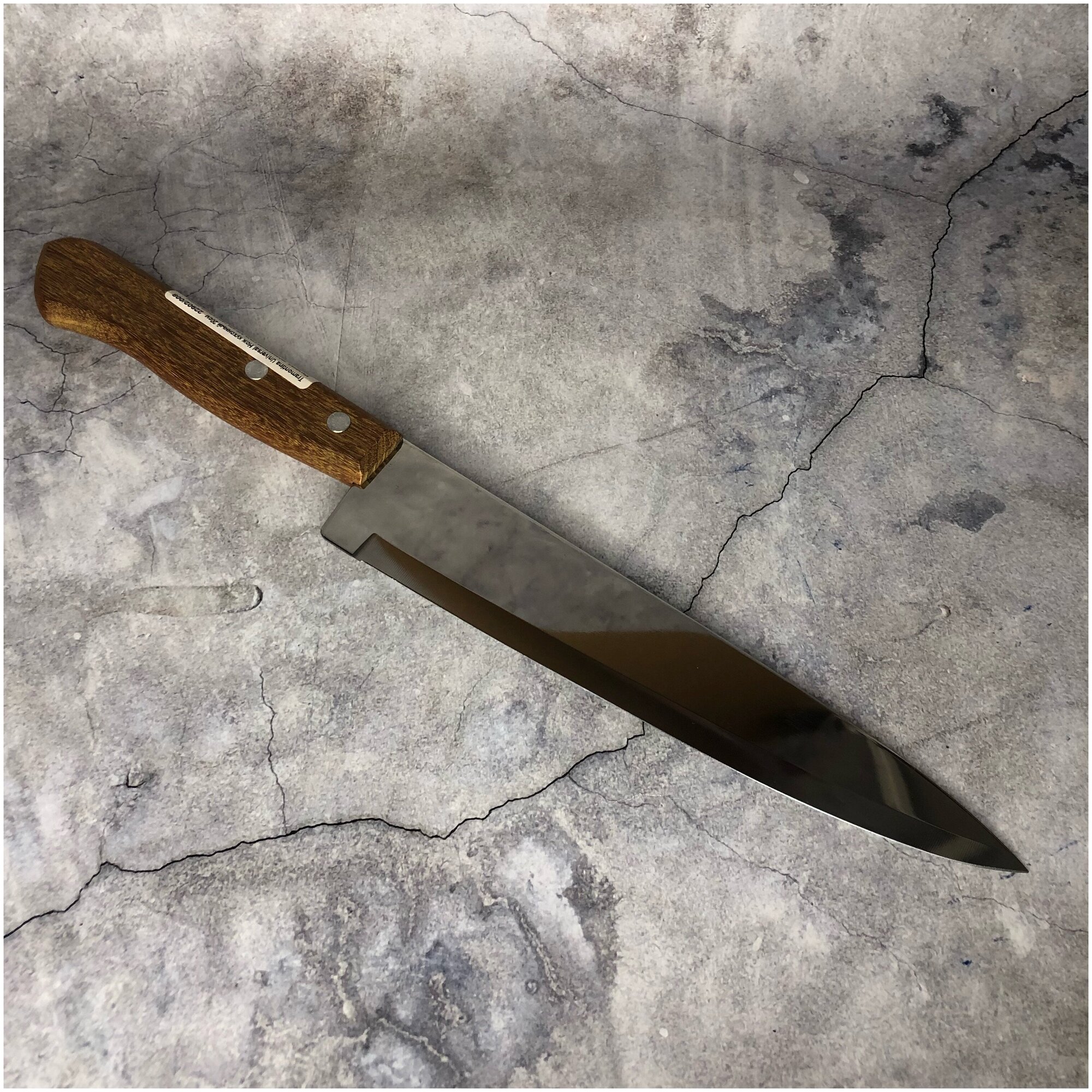 Нож поварской Tramontina Universal лезвие 175 см сталь AISI 420 деревянная рукоять