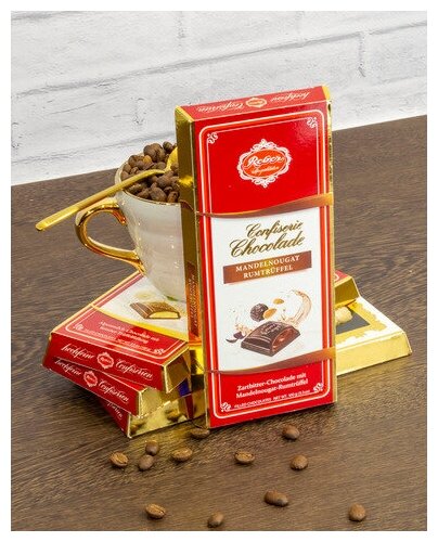 Шоколад горький Reber Almond Praline-Rum Truffle с трюфильной начинкой из миндаля и рома, 100 г - фотография № 13