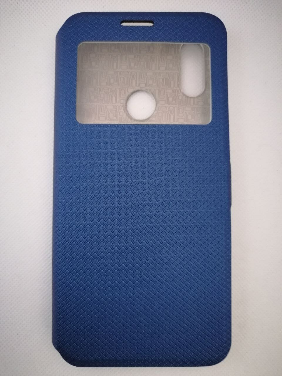 Чехол-книжка для смартфона Huawei Y6 (2018) синего цвета с окошком, магнитной застежкой и подставкой.