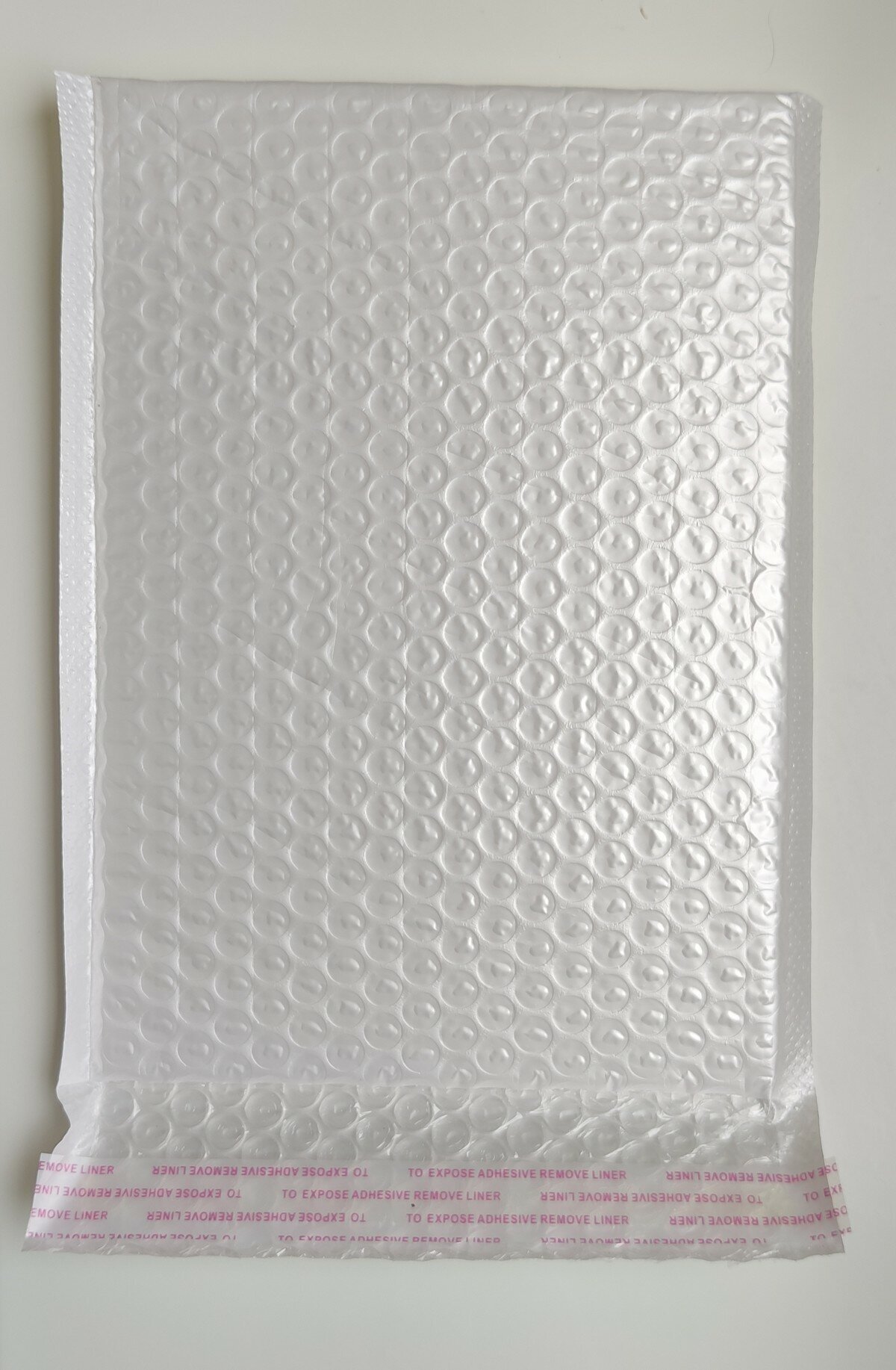 Пакет упаковочный воздушно-пузырьковый (пупырчатый) с клеевым краем, размер 18*23см + 4см, белый, непрозрачный, 10 шт - фотография № 2