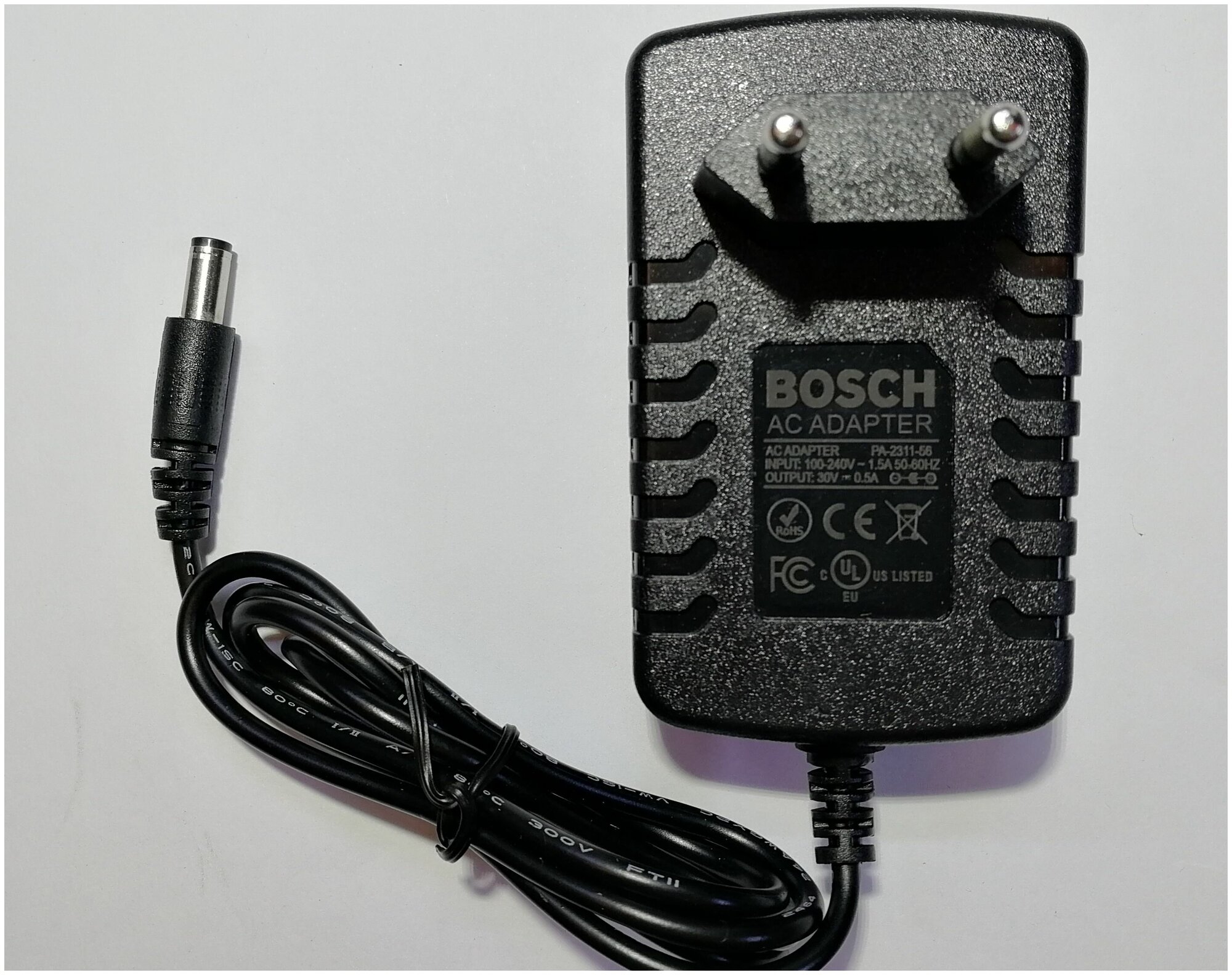 Блок питания Bosch Athlet 12006118 30v - 0,5a, 5.5 x 2.1 mm, 15W - фотография № 1