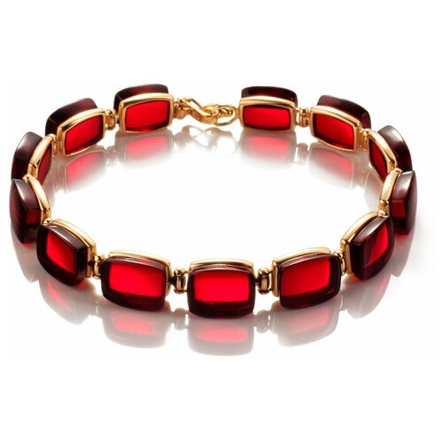Amberholl Эффектный золотой браслет с натуральным янтарём красного цвета «Сангрил»