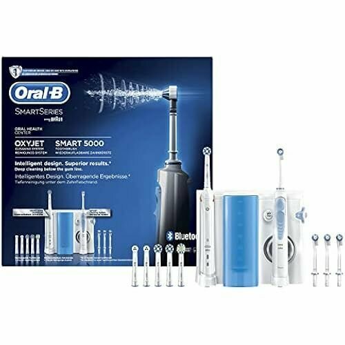 Электрическая зубная щетка Oral-B Oral Health Center Smart 5000 ирригатор Oxyjet для лучшего удаления налета и здоровья десен 4 насадки Oxyjet 6 насадок белые 2891200₽