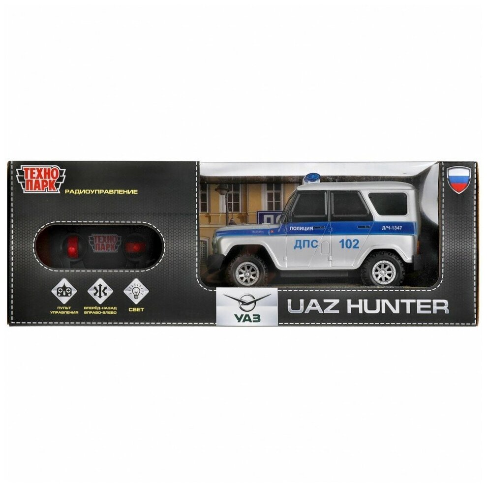 314129 Машина р/у UAZ HUNTER полиция 18 свет