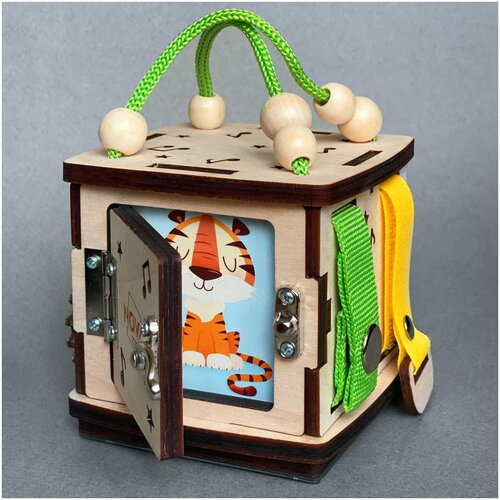 фото Бизиборд, бизикубик тигр с дверкой для малыша, детей, мальчика, девочки, развивающая игрушка в дорогу как подарок nova toys