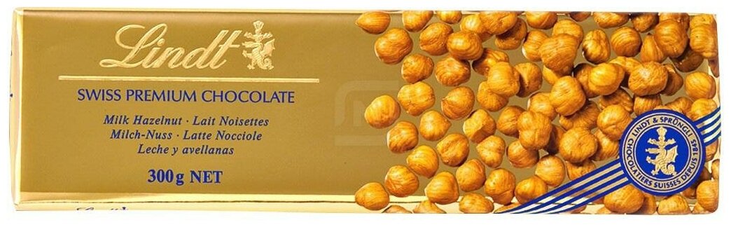 Шоколад Lindt Gold Swiss Premium Milk - Hazelnut Chocolate / Линд Премиум Молочный с цельным фундуком, 300 гр (Швейцария) - фотография № 10