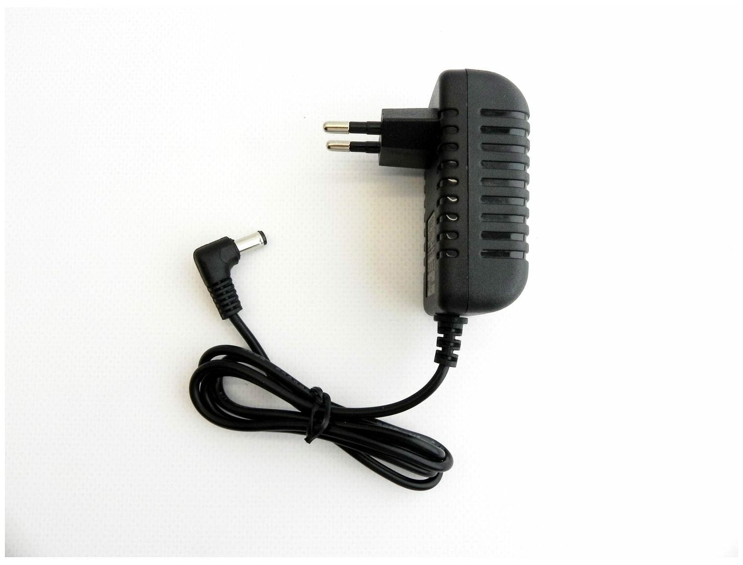 Универсальный блок питания 9V 06A 6W 5521 угловой штекер