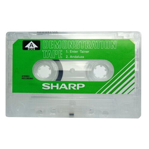 Аудиокассета SHARP демонстрационная зелёная 10 минутные для магнитофонов SHARP. Бланк.