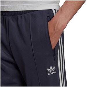 Adidas beckenbauer top orange pants