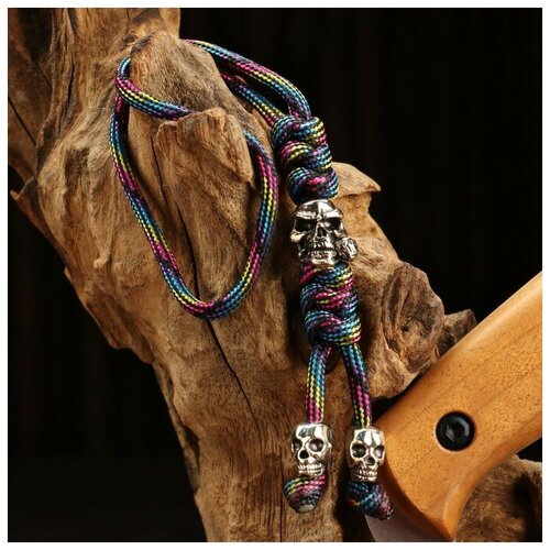 фото Темляк для ножа, с бусиной череп, фиолетовый noname