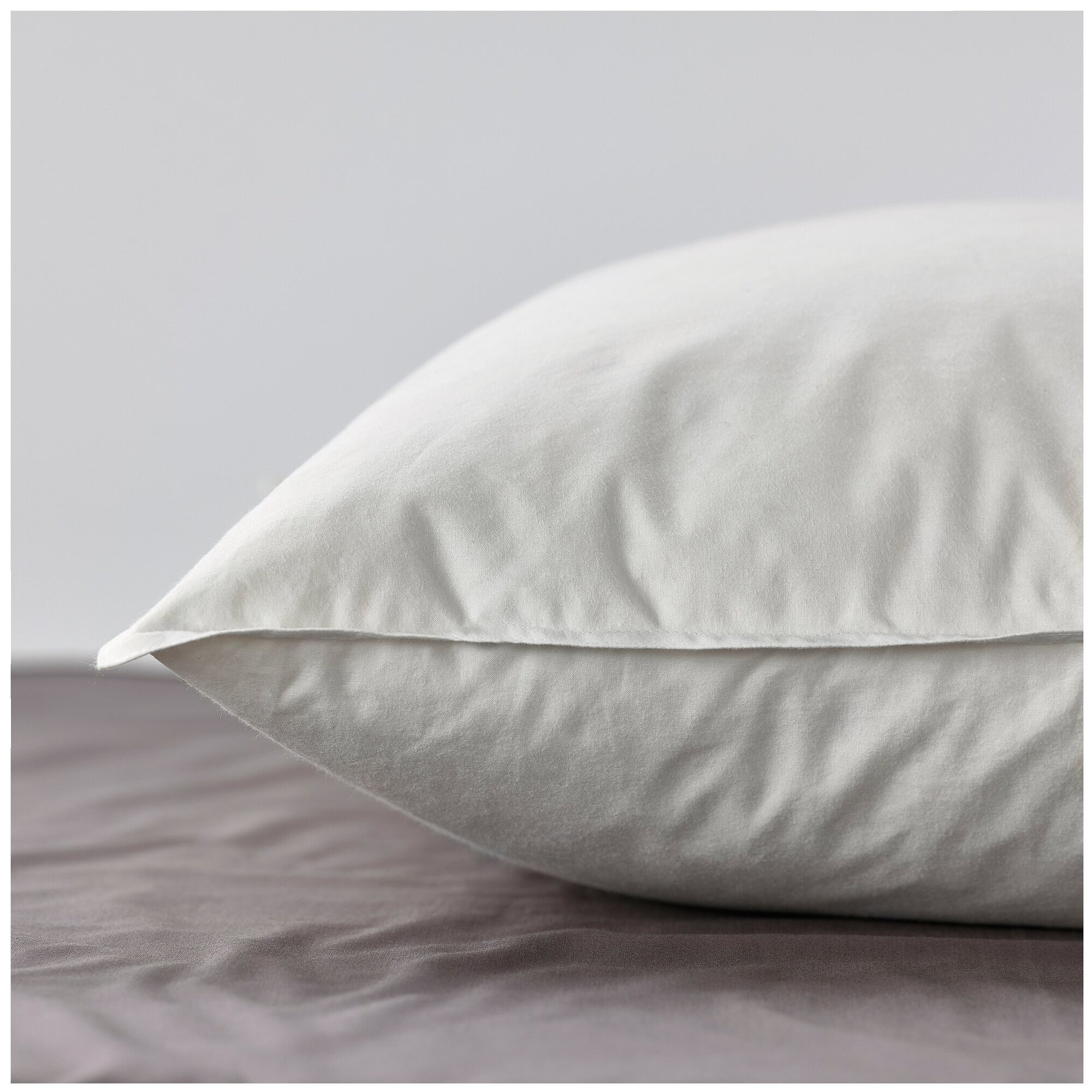 Подушка IKEA LUNDTRAV 50*60, подушка для сна икеа низкая - фотография № 2