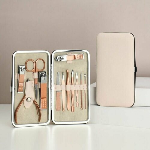 Набор маникюрный 12 предметов в футляре цвет бежевыйрозовое золото 1610₽