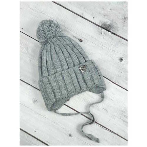 фото Шапка демисезонная вязаная на завязках с помпоном для мальчика (осень-весна) синего цвета на 4-5 лет нет бренда