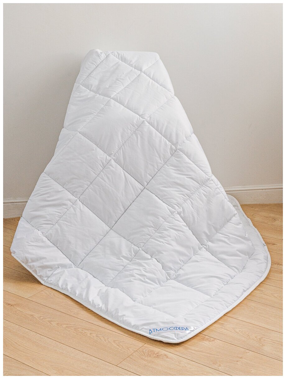 Одеяло 1,5 спальное лебяжий пух 142х205 гипоаллергенное - фотография № 2
