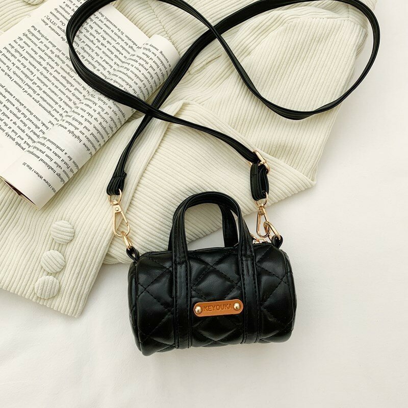 Стильная мини-круглая сумка-ведро для детей черного цвета с модным узором