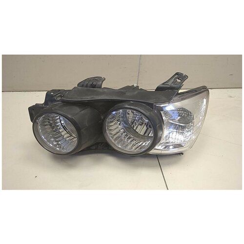 Фара левая CHEVROLET AVEO T-300 2011- с механическим корректором / черная