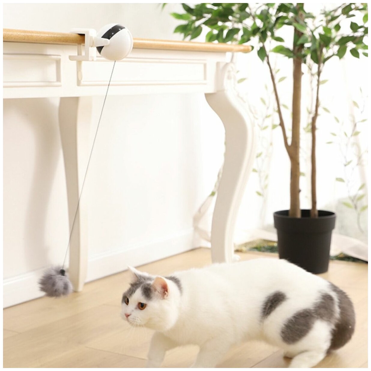 Интерактивная автоматическая игрушка-дразнилка для кошек - фотография № 17