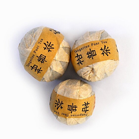 Чай элитный прессованный Шу Пуэр в мандарине (Шу Юннань) 1 шт 42 гр.