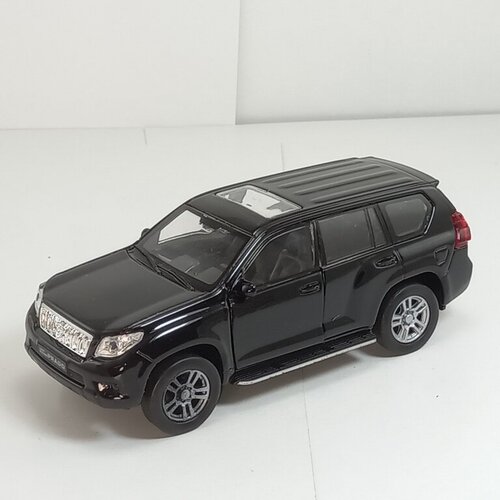 металлическая машинка 1 34 1 39 toyota fj cruiser белый 43639l d welly Металлическая машинка 1:34-1:39 TOYOTA LAND CRUISER, белый 43630L-D Welly