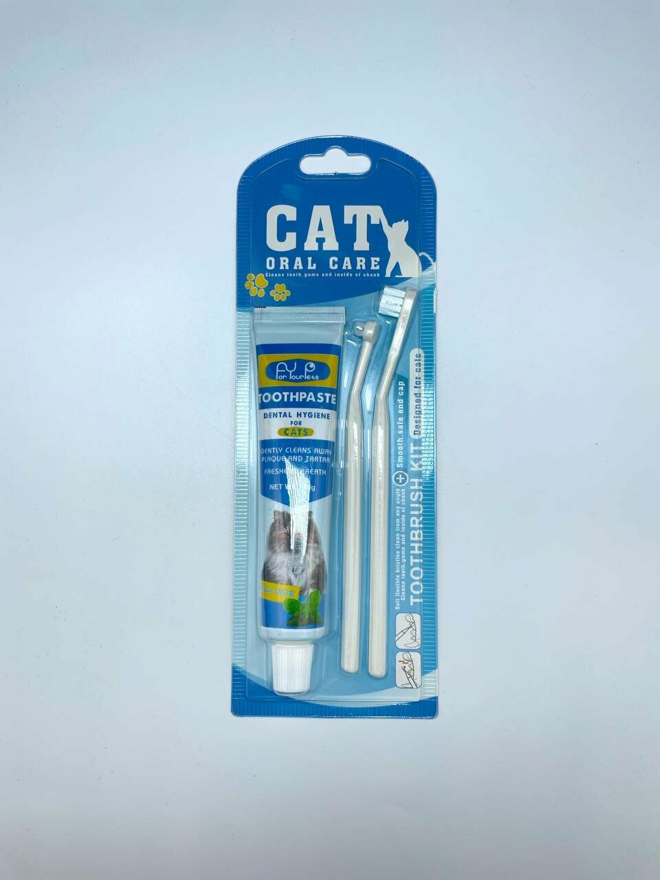 Набор с зубной пастой и щетками для бережного ухода за зубами кошек