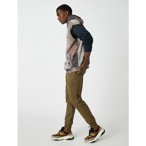 фото Брюки koton, размер 46, хаки