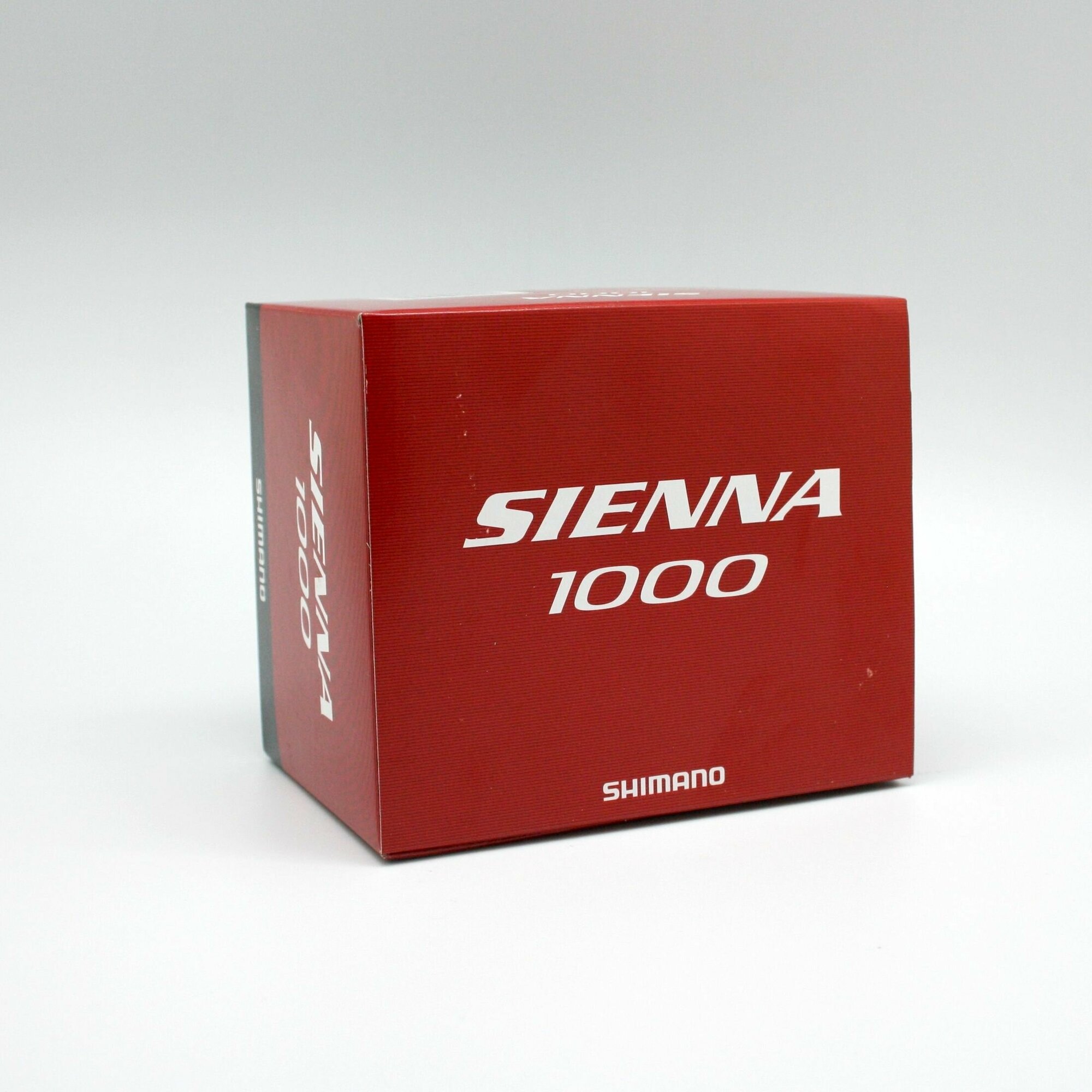 Катушка Shimano Sienna 1000 FG безинерц. черный/красный (SN1000FG) - фото №13