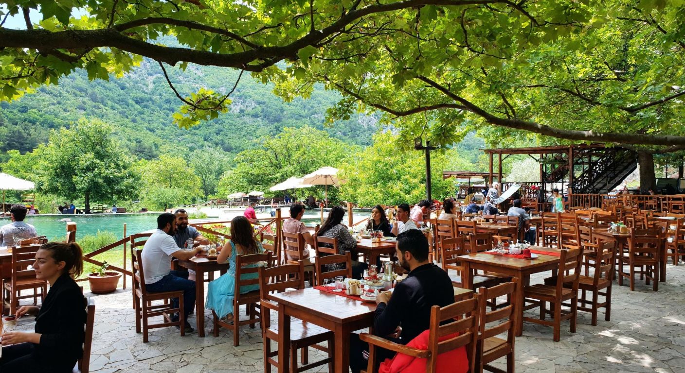 A serene outdoor restaurant in Yakapark with wooden tables under leafy trees, surrounded by lush green hills, where a waiter serves traditional Turkish tea and dishes to smiling guests.