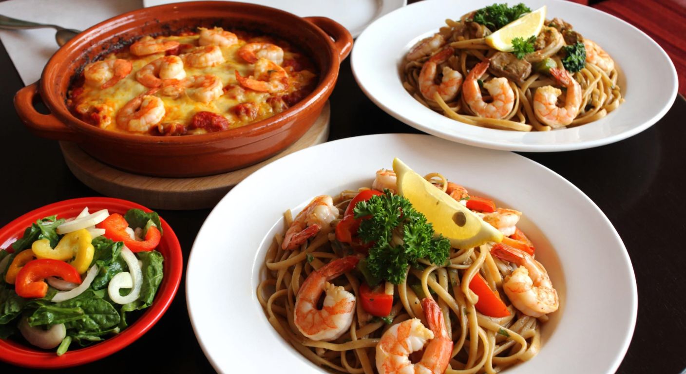 A vibrant Turkish dining table set with a steaming clay pot of shrimp casserole, a golden shrimp stir-fry, a fresh shrimp salad with colorful vegetables, and a plate of whole wheat pasta with shrimp, all garnished with lemon wedges and parsley.