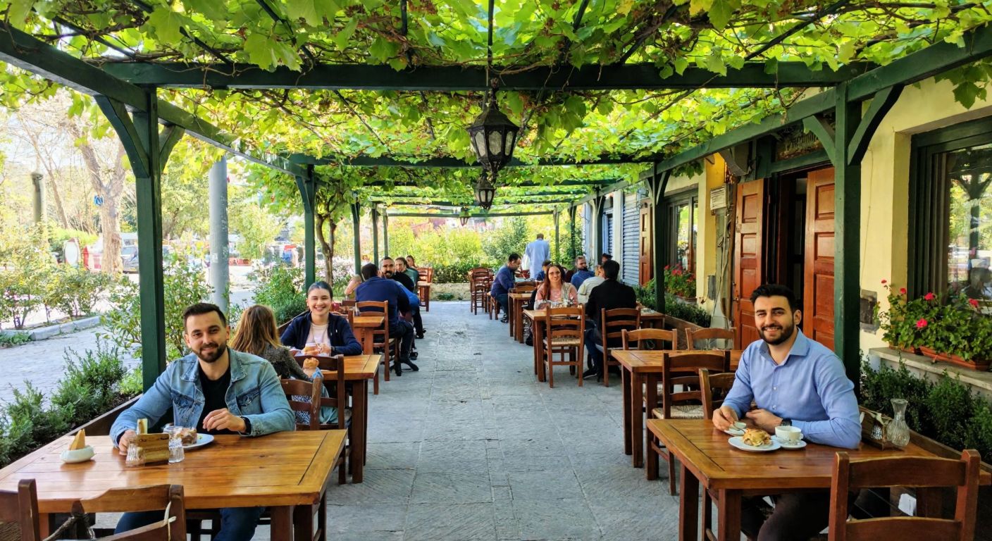 A cozy outdoor café in Istanbul with wooden tables under vine-covered pergolas, where smiling people enjoy traditional Turkish tea and baklava in a serene garden setting.