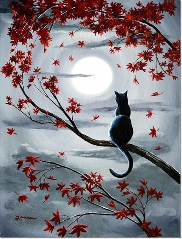 кошка на ветке фото