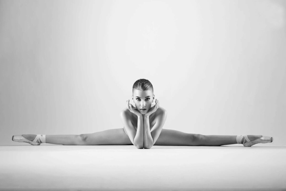 Images of topless women stretching