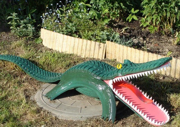 фигуры из шин для сада фото