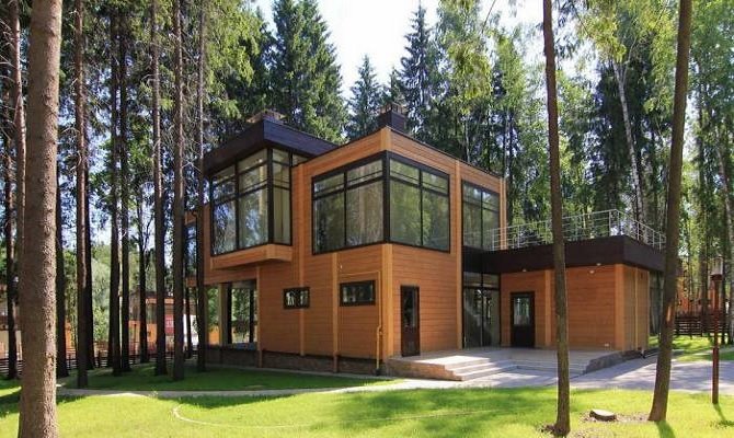 панорамный дом в лесу фото