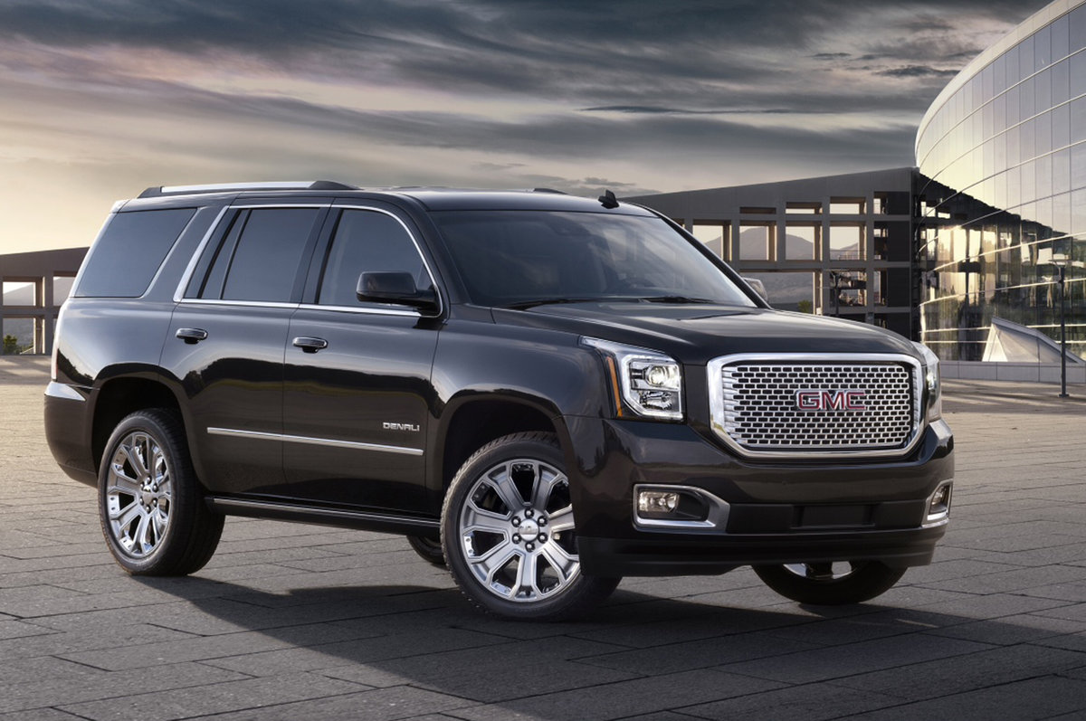 gmc yukon denali и кадиллак эскалейд фото