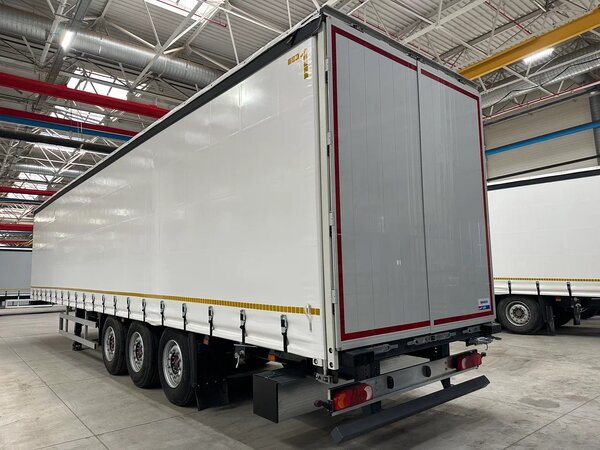 Какой полуприцеп выбрать: для магистрали или стройки?