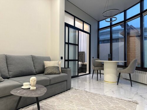 Апартаменты 🏙🌊 Современный пентхаус с панорамными окнами, террасой и видом на море в Махачкале