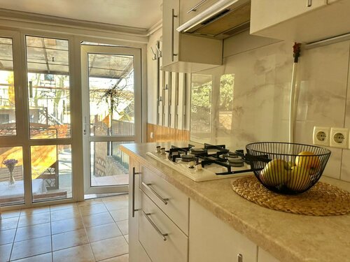 Таунхаус Уютный 2-комнатный дом у моря с собственным двориком и мангальной зоной  в Евпатории